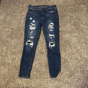 American eagle skinny jeggings. Stretchy size 8 with rips and patches.